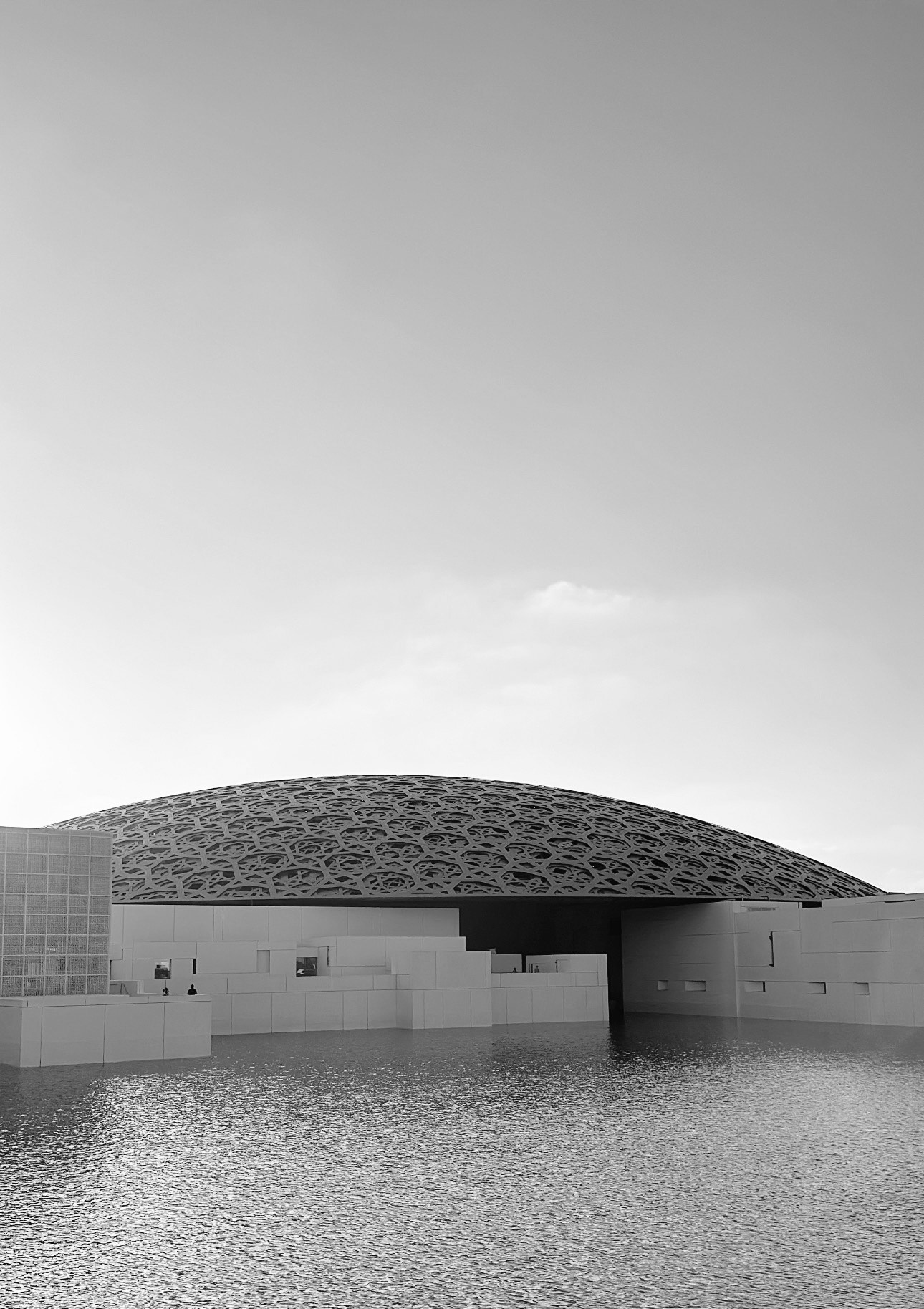 Louvre Abu Dhabi — its latticed dome over the water